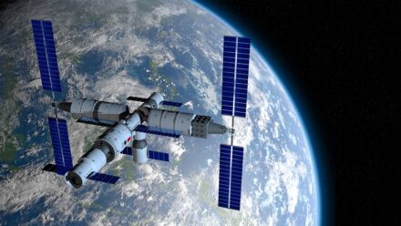 TIANGONG 3 – Chinese space station orbiting the planet Earth on black space with stars background. 3D Illustration